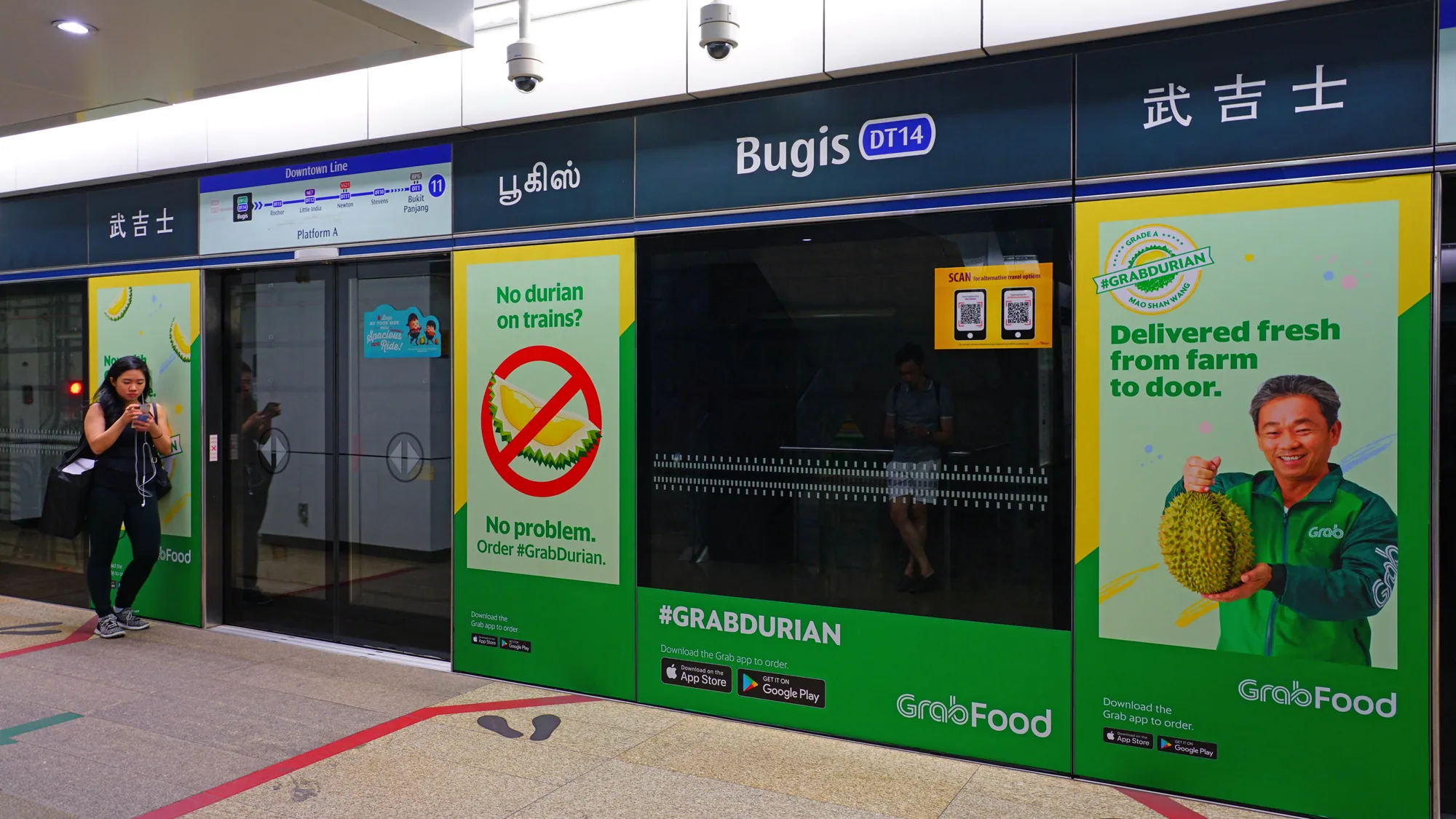 Metro advertising at Bugis station in Singapore: GrabFood posters ask, No durian on trains? No problem, order #GrabDurian.