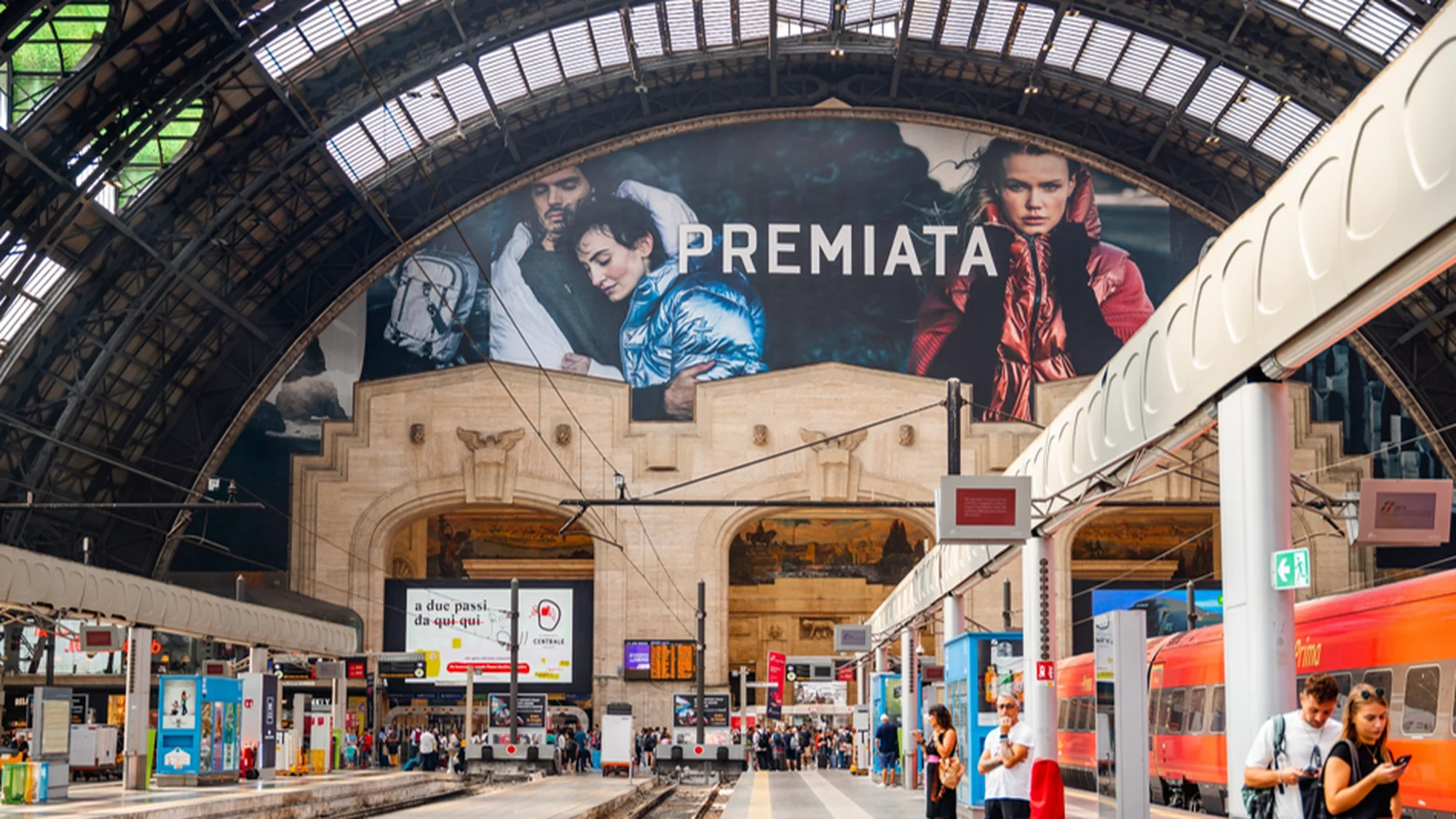 Digital out-of-home advertising in Milan, Italy: a Dior Sauvage screen showing Johnny Depp and the fragrance bottle is mounted on the Duomo.