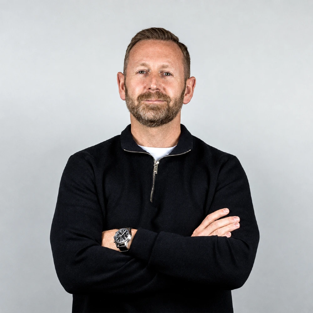 Portrait of John, Managing Director for Europe and the Americas at OOH Global.