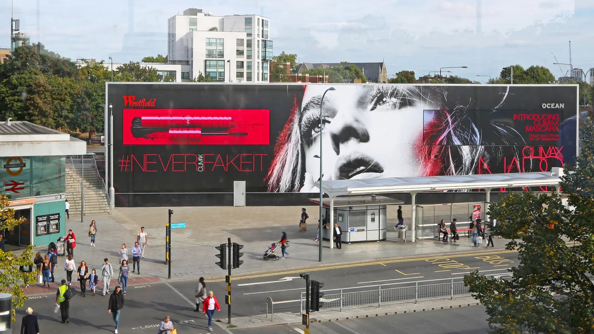 Digital billboard advertising at Piccadilly Circus in London, in the United Kingdom: curved screens show a Meta Quest 2 advert, Coca-Cola and Bvlgari above a Boots store, with a crowd and a red bus in front.