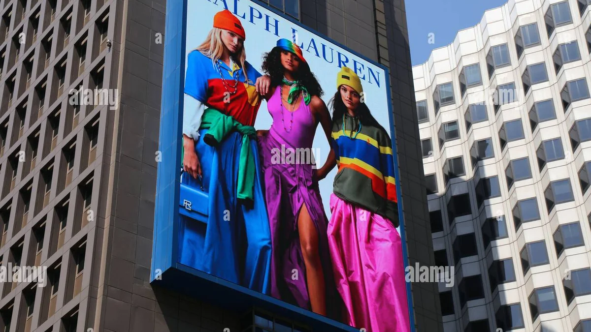 Digital building banner advertising: a large Ralph Lauren screen shows three models in bright clothing on a tower facade.